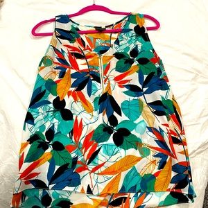 Vibrant floral summer top with zipper accent in front